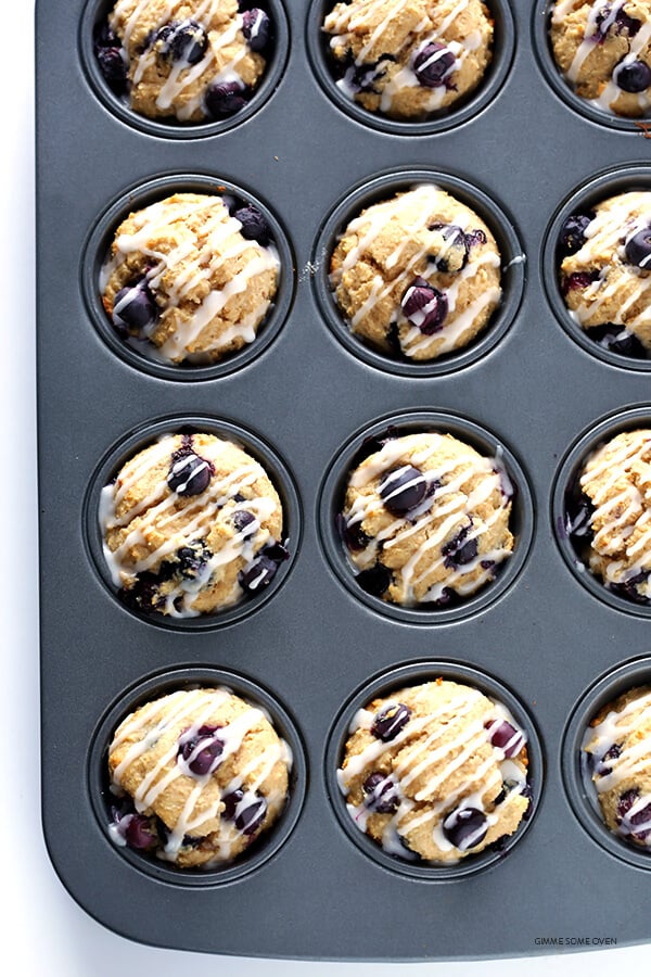 Healthier Blueberry Muffins -- made with white whole wheat flour, naturally sweetened, and SO fluffy and buttery and delicious! | gimmesomeoven.com