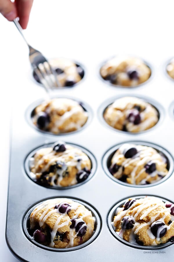 Healthier Blueberry Muffins -- made with white whole wheat flour, naturally sweetened, and SO fluffy and buttery and delicious! | gimmesomeoven.com