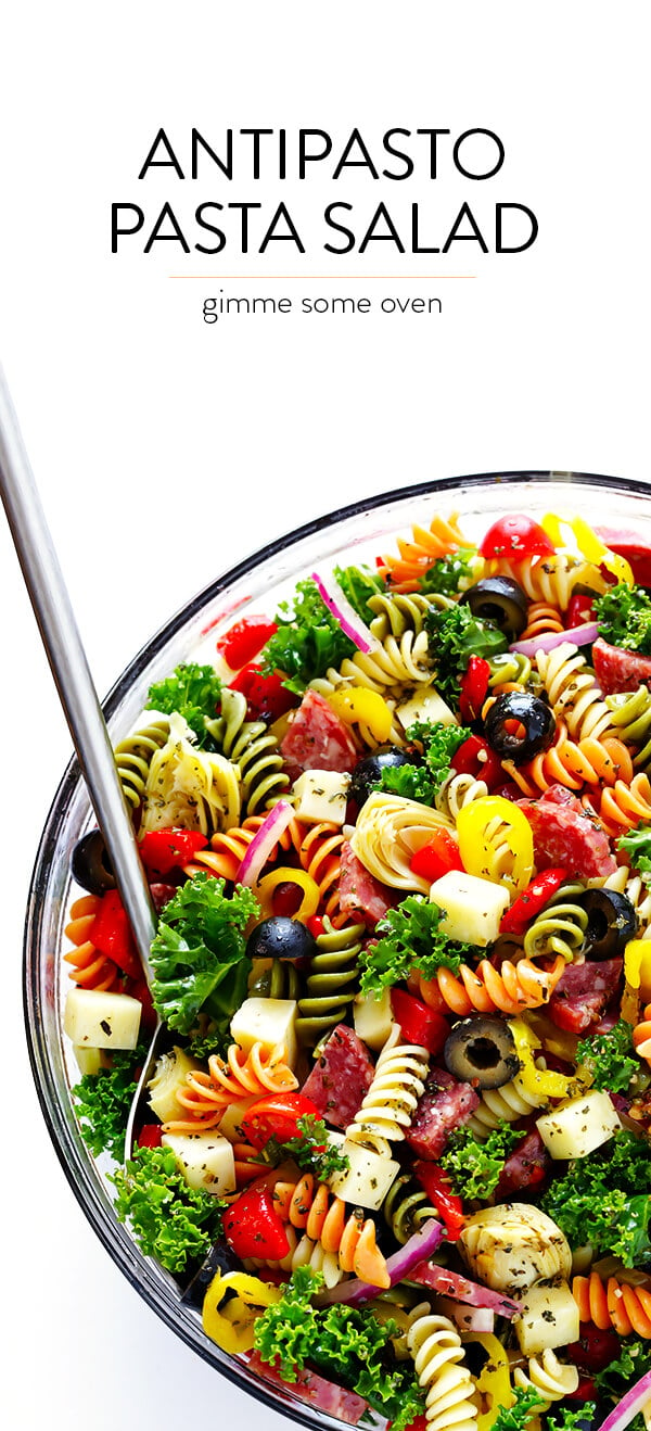 This Rainbow Antipasto Pasta Salad is the perfect way to use up leftover antipasto ingredients! Plus, it's easy to make, tossed with a zesty Italian herb vinaigrette, and absolutely delicious! | gimmesomeoven.com