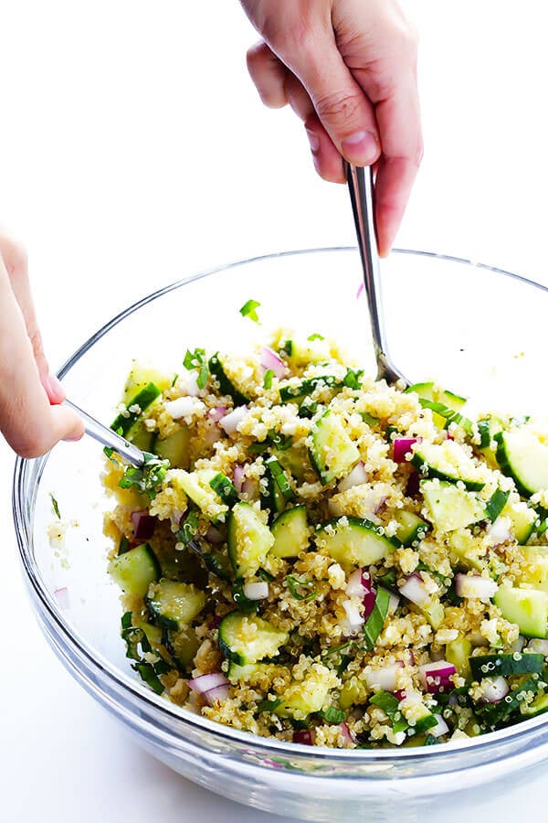 Love this Cucumber Quinoa Salad! It's super easy to make ahead of time, it's naturally gluten-free, and it's made with lots of fresh cucumber, feta, basil, red onion, and a simple lemon Italian vinaigrette. Perfect as a side or main dish! | gimmesomeoven.com