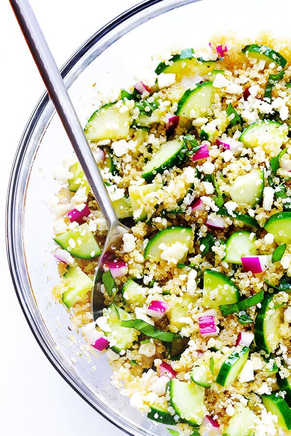 Love this Cucumber Quinoa Salad! It's super easy to make ahead of time, it's naturally gluten-free, and it's made with lots of fresh cucumber, feta, basil, red onion, and a simple lemon Italian vinaigrette. Perfect as a side or main dish! | gimmesomeoven.com