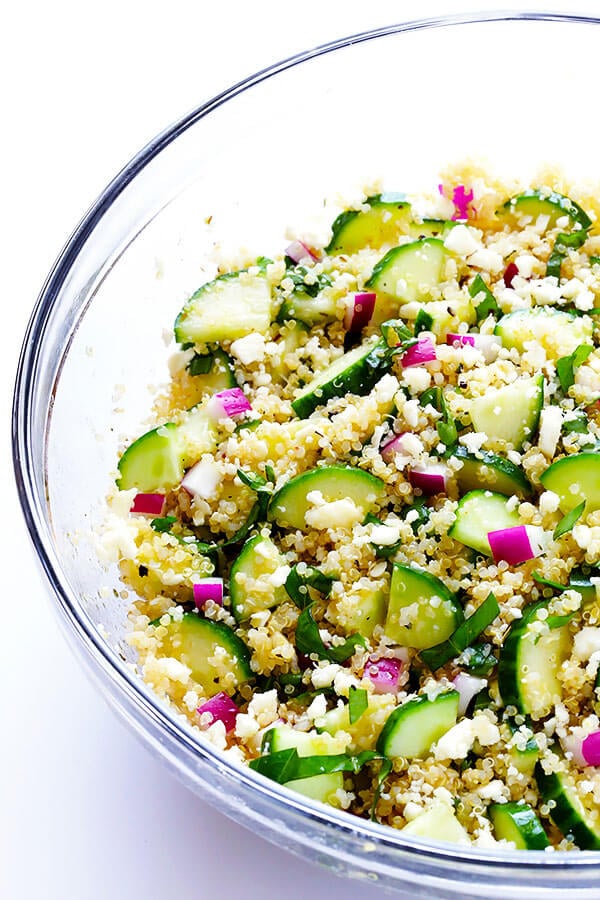 Love this Cucumber Quinoa Salad! It's super easy to make ahead of time, it's naturally gluten-free, and it's made with lots of fresh cucumber, feta, basil, red onion, and a simple lemon Italian vinaigrette. Perfect as a side or main dish! | gimmesomeoven.com