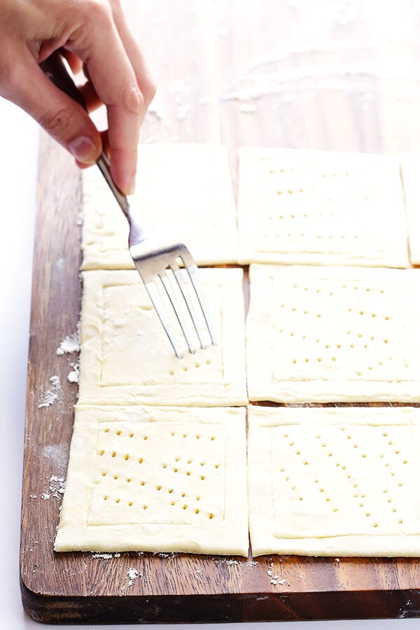 These Smoked Salmon and Cream Cheese pastries are super-easy to make with puff pastry, and they're always a crowd pleaser! | gimmesomeoven.com