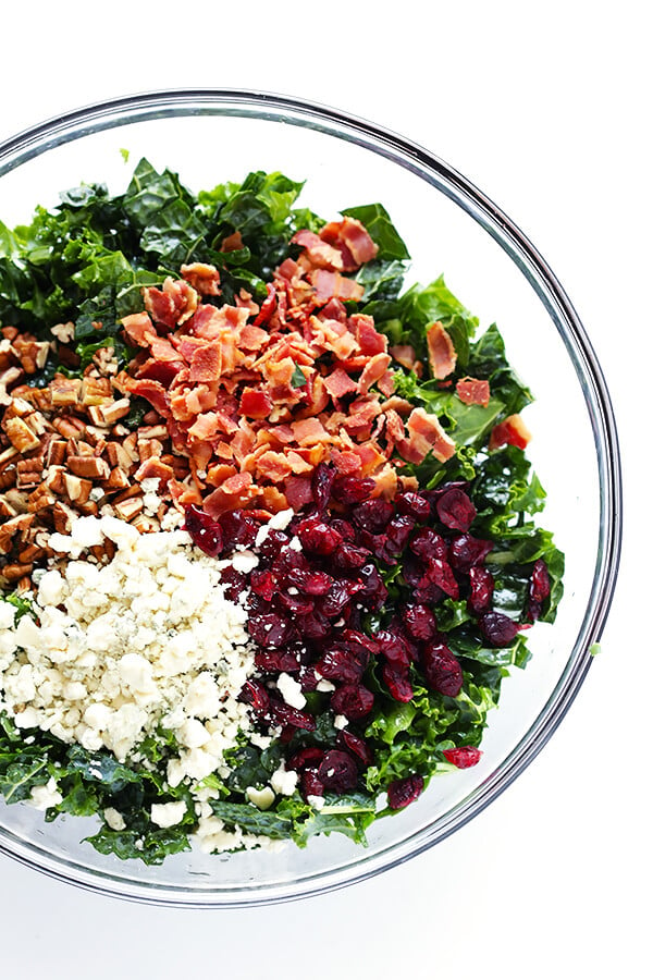 This Kale Salad with Bacon and Blue Cheese is quick and easy to make, tossed with a red wine shallot vinaigrette, and TOTALLY delicious. (Bonus, it holds up for hours in the fridge, if you want to make it ahead of time!) | gimmesomeoven.com