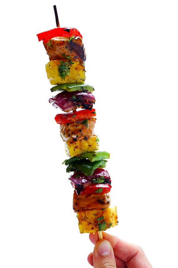 These Rainbow Hawaiian Chicken Kabobs are marinated and basted in a tasty teriyaki sauce, then grilled to perfection and sprinkled with cilantro. So delicious! | gimmesomeoven.com