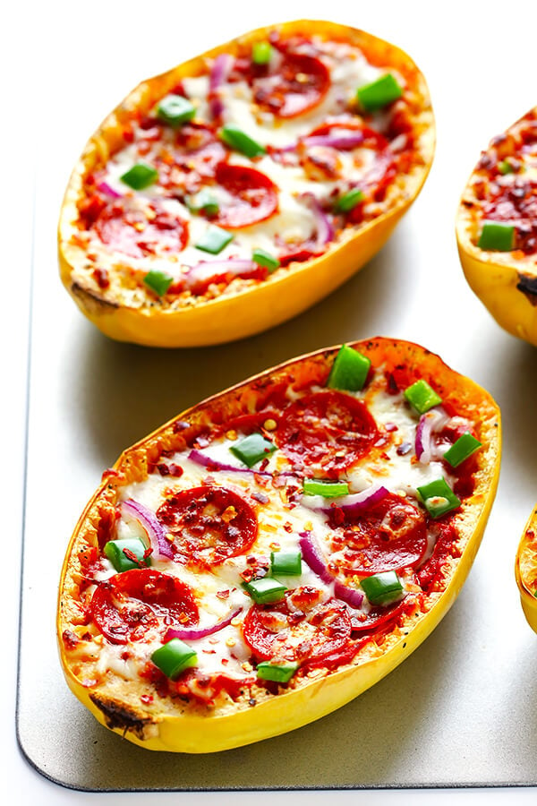 These Pizza Spaghetti Squash Boats are easy to make, fun to customize with your favorite pizza toppings, and absolutely delicious! | gimmesomeoven.com (Gluten-free)