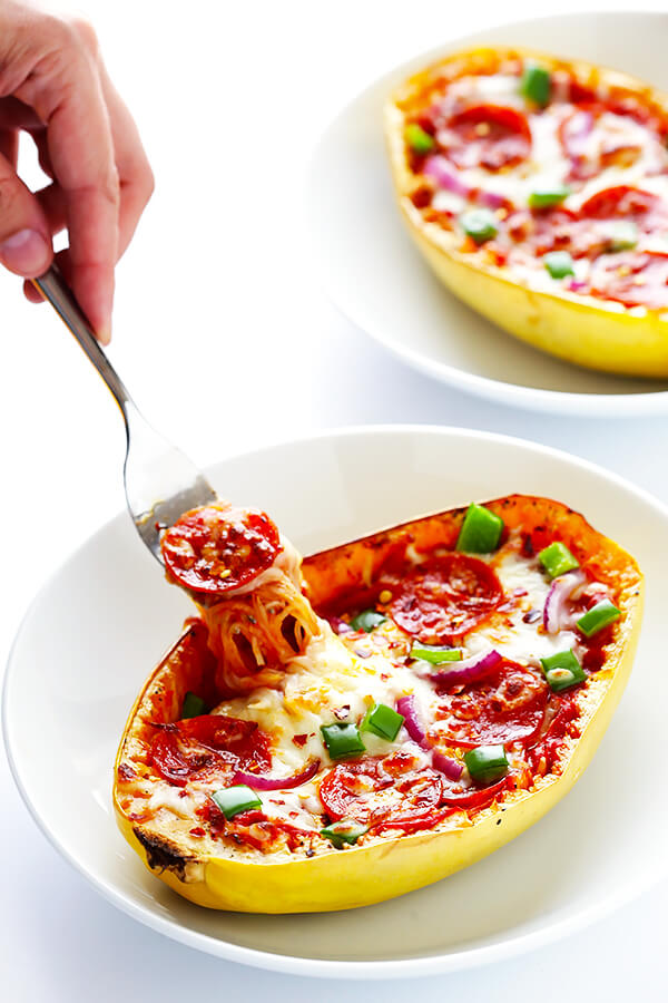 These Pizza Spaghetti Squash Boats are easy to make, fun to customize with your favorite pizza toppings, and absolutely delicious! | gimmesomeoven.com (Gluten-free)