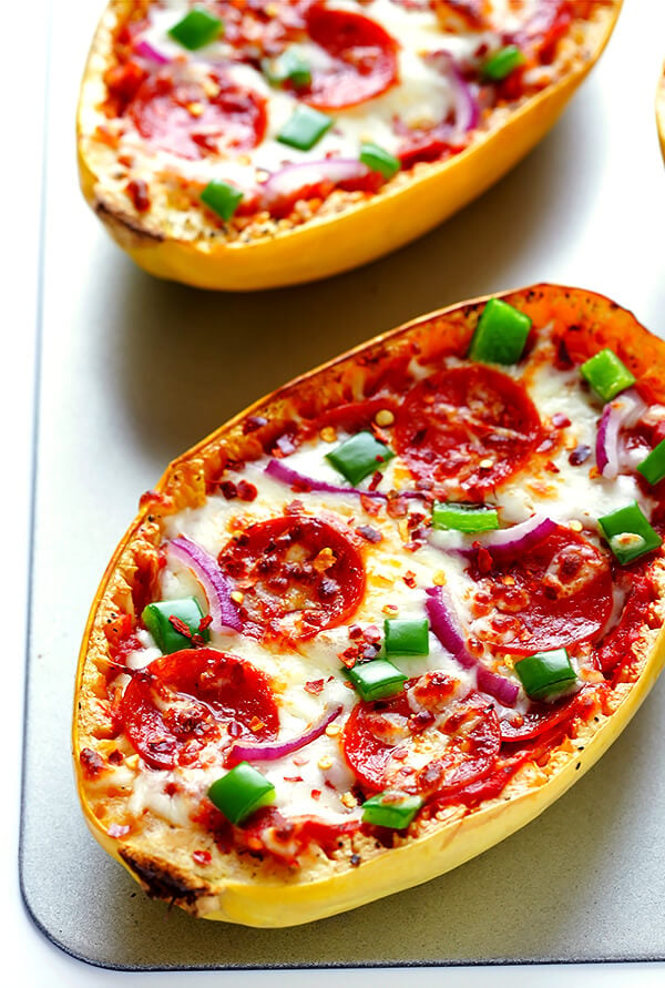 These Pizza Spaghetti Squash Boats are easy to make, fun to customize with your favorite pizza toppings, and absolutely delicious! | gimmesomeoven.com (Gluten-free)