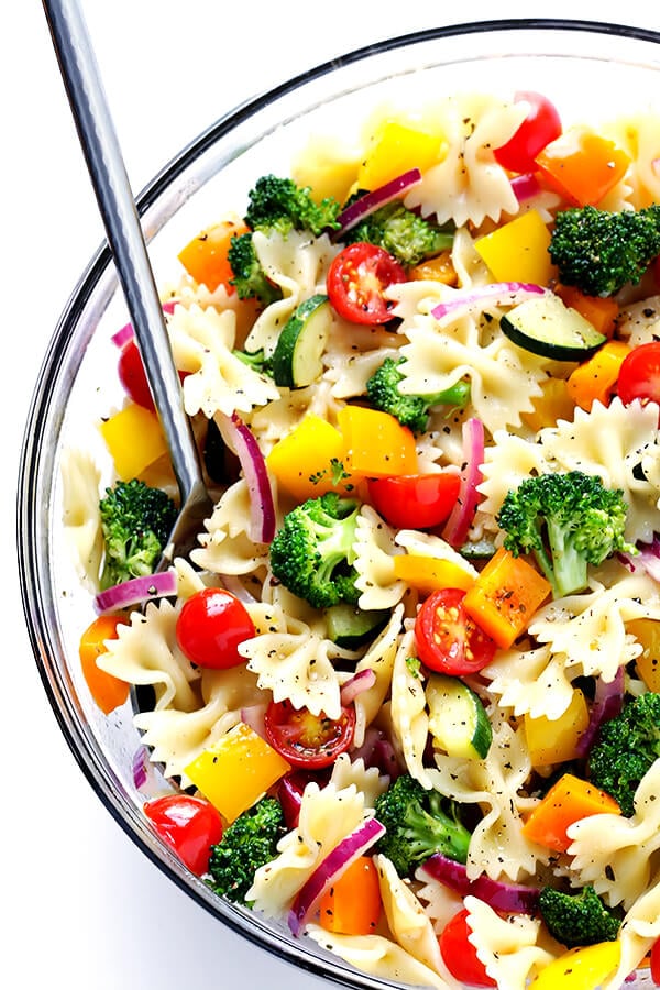 This Veggie Lovers' Pasta Salad recipe is easy to make with whatever veggies you have on hand, it's tossed with a yummy white balsamic vinaigrette, and it's absolutely perfect for a party or picnic or potluck (or any regular weeknight dinner)! | gimmesomeoven.com