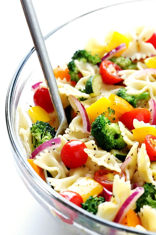 This Veggie Lovers' Pasta Salad recipe is easy to make with whatever veggies you have on hand, it's tossed with a yummy white balsamic vinaigrette, and it's absolutely perfect for a party or picnic or potluck (or any regular weeknight dinner)! | gimmesomeoven.com