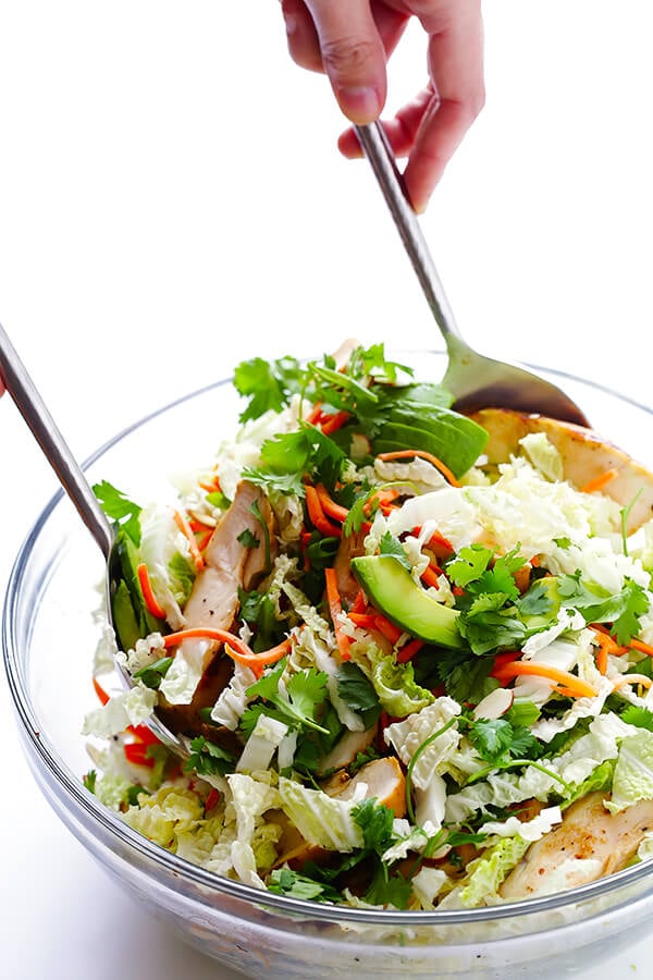 This Asian Chicken Chopped Salad recipe is quick and easy to make, packed with fresh ingredients and zesty chicken, and tossed with a heavenly creamy sesame ginger vinaigrette. So delicious!! | gimmesomeoven.com