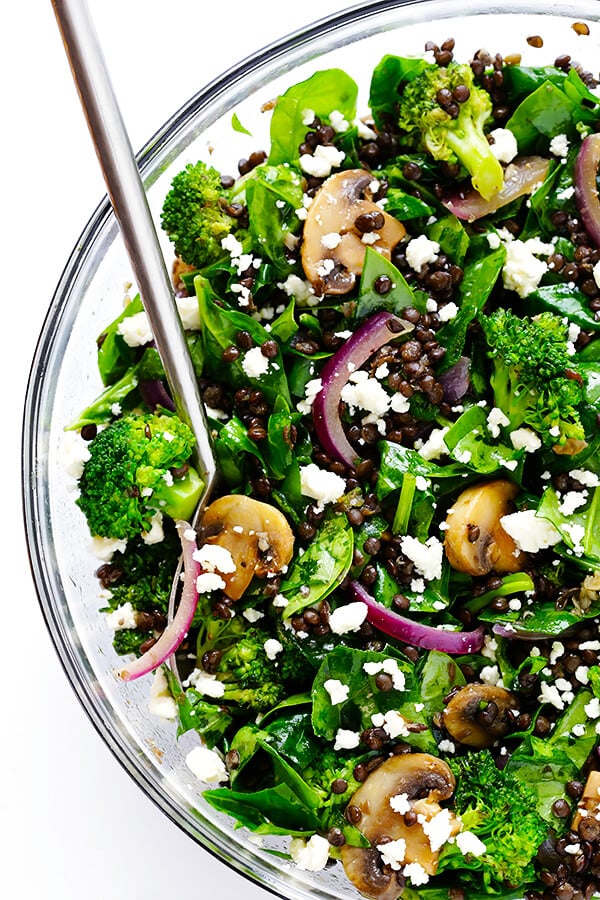 This Zesty Lentil Spinach Salad recipe is ready to go in about 30 minutes, made with hearty lentils, sauteed veggies, lots of fresh spinach, and a tangy lemon dressing. It's SO delicious, and also makes great leftovers! | gimmesomeoven.com (Vegetarian / Gluten-Free)