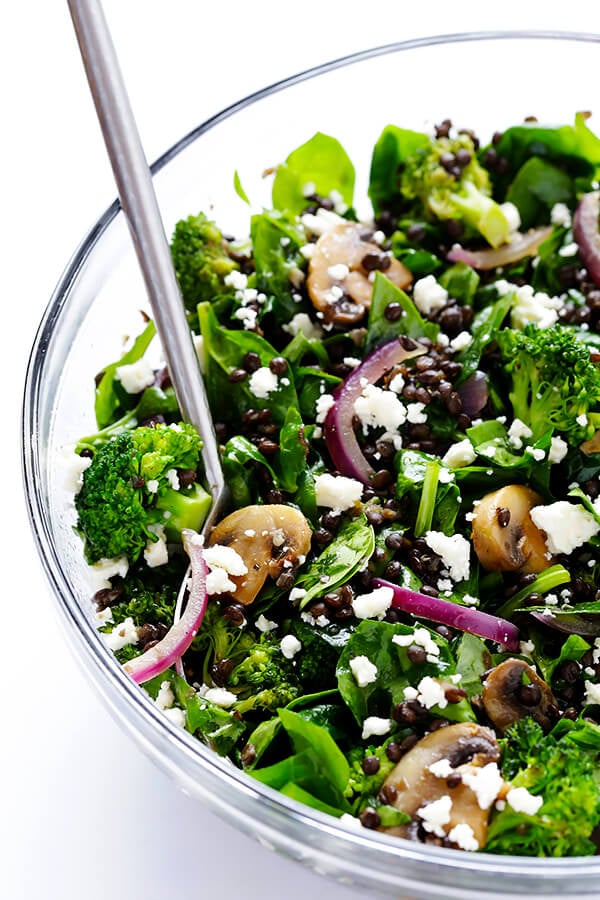 This Zesty Lentil Spinach Salad recipe is ready to go in about 30 minutes, made with hearty lentils, sauteed veggies, lots of fresh spinach, and a tangy lemon dressing. It's SO delicious, and also makes great leftovers! | gimmesomeoven.com (Vegetarian / Gluten-Free)