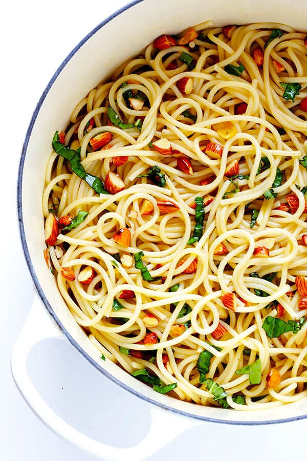 Lemon Basil Spaghetti with Almonds -- quick and easy to make, full of zesty garlic lemon flavor, and topped with a sprinkle of Parmesan. So delicious! | gimmesomeoven.com