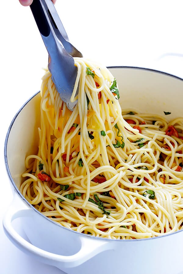 Lemon Basil Spaghetti with Almonds -- quick and easy to make, full of zesty garlic lemon flavor, and topped with a sprinkle of Parmesan. So delicious! | gimmesomeoven.com