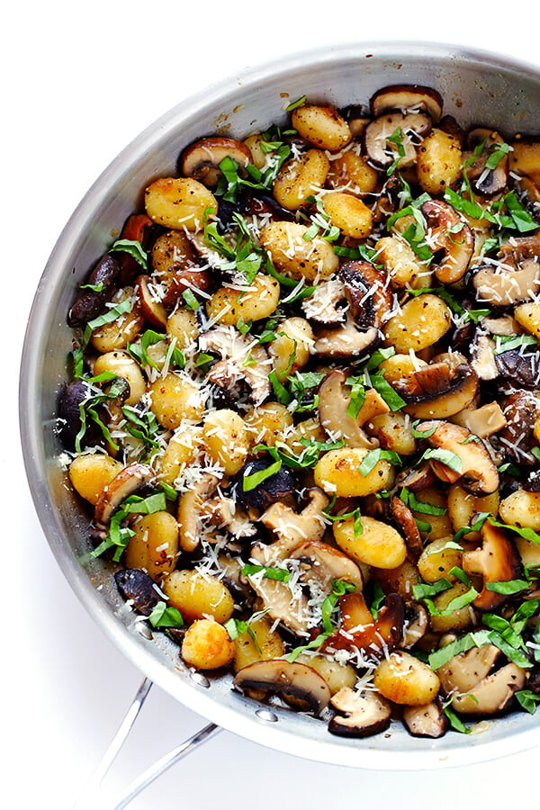 This Toasted Gnocchi with Mushrooms, Basil and Parmesan recipe only takes about 30 minutes to prepare, it's nice and hearty, and full of absolutely delicious flavors! | gimmesomeoven.com (Gluten-Free / Vegetarian)