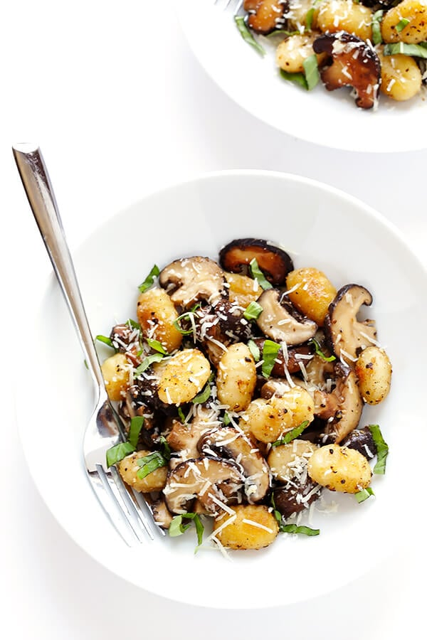 This Toasted Gnocchi with Mushrooms, Basil and Parmesan recipe only takes about 30 minutes to prepare, it's nice and hearty, and full of absolutely delicious flavors! | gimmesomeoven.com (Gluten-Free / Vegetarian)