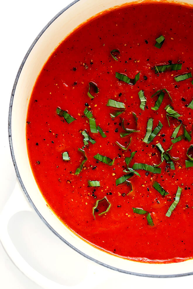 This 20-Minute Tomato Soup recipe is quick and easy to make, made with lots of fresh basil and garlic, and absolutely delicious! | gimmesomeoven.com (Vegan / Vegetarian / Gluten-Free)