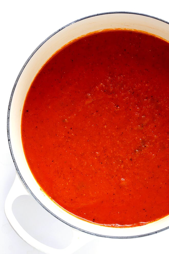 This 20-Minute Tomato Soup recipe is quick and easy to make, made with lots of fresh basil and garlic, and absolutely delicious! | gimmesomeoven.com (Vegan / Vegetarian / Gluten-Free)