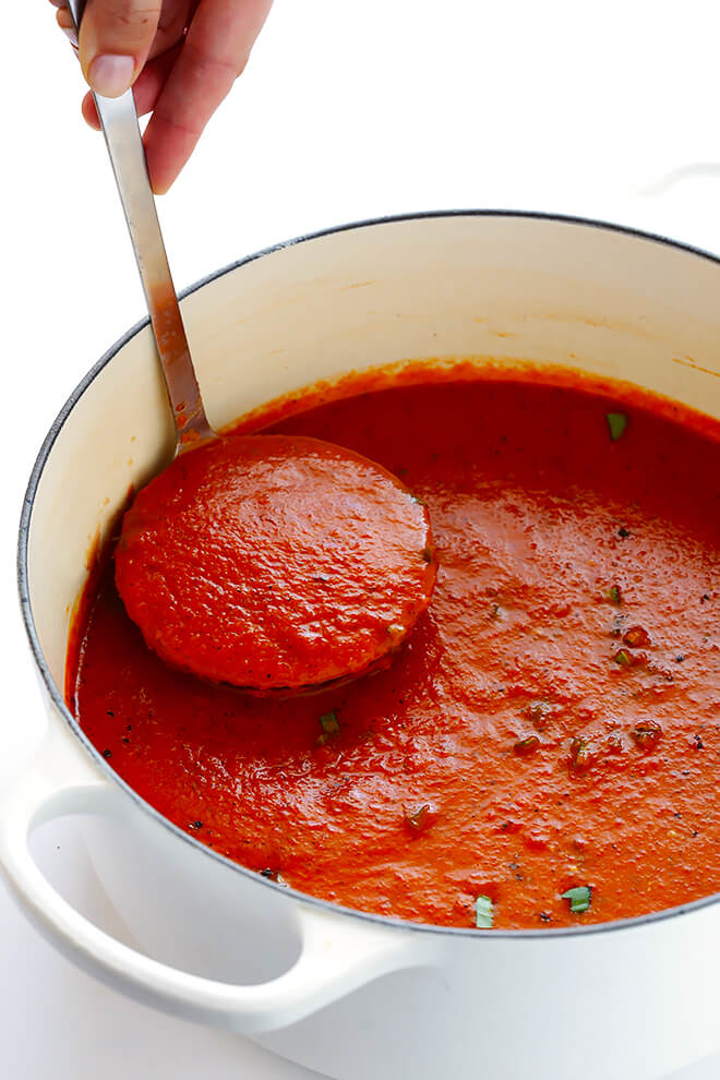 This 20-Minute Tomato Soup recipe is quick and easy to make, made with lots of fresh basil and garlic, and absolutely delicious! | gimmesomeoven.com (Vegan / Vegetarian / Gluten-Free)