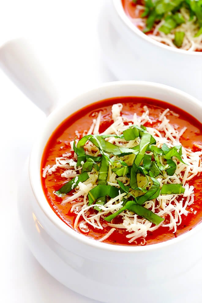 This 20-Minute Tomato Soup recipe is quick and easy to make, made with lots of fresh basil and garlic, and absolutely delicious! | gimmesomeoven.com (Vegan / Vegetarian / Gluten-Free)