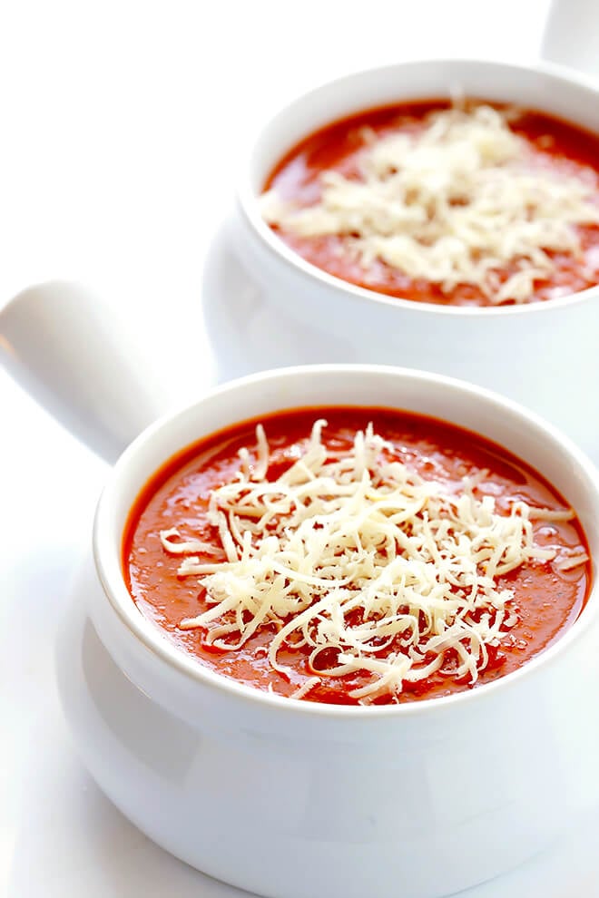 This 20-Minute Tomato Soup recipe is quick and easy to make, made with lots of fresh basil and garlic, and absolutely delicious! | gimmesomeoven.com (Vegan / Vegetarian / Gluten-Free)