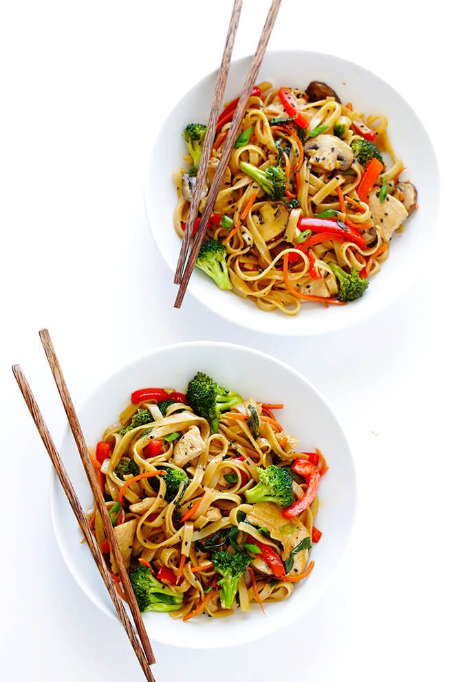 This 30-Minute Sesame Chicken Noodle Stir-Fry recipe is quick and easy to make, easy to customize with whatever fresh veggies or greens you have on hand, and it's tossed with the most delicious sesame-soy vinaigrette! | gimmesomeoven.com