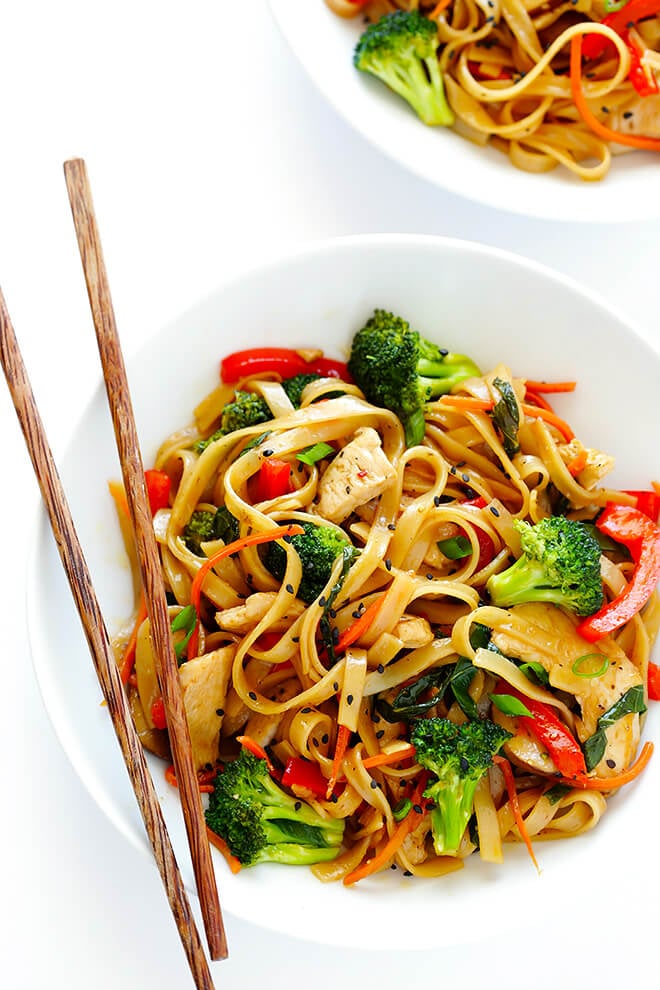 This 30-Minute Sesame Chicken Noodle Stir-Fry recipe is quick and easy to make, easy to customize with whatever fresh veggies or greens you have on hand, and it's tossed with the most delicious sesame-soy vinaigrette! | gimmesomeoven.com