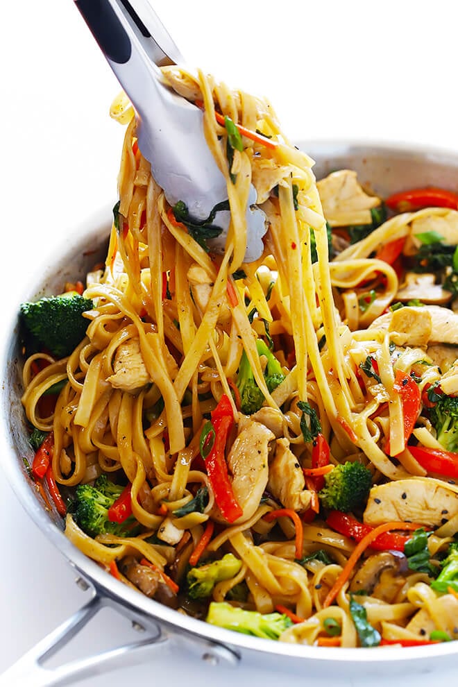 This 30-Minute Sesame Chicken Noodle Stir-Fry recipe is quick and easy to make, easy to customize with whatever fresh veggies or greens you have on hand, and it's tossed with the most delicious sesame-soy vinaigrette! | gimmesomeoven.com