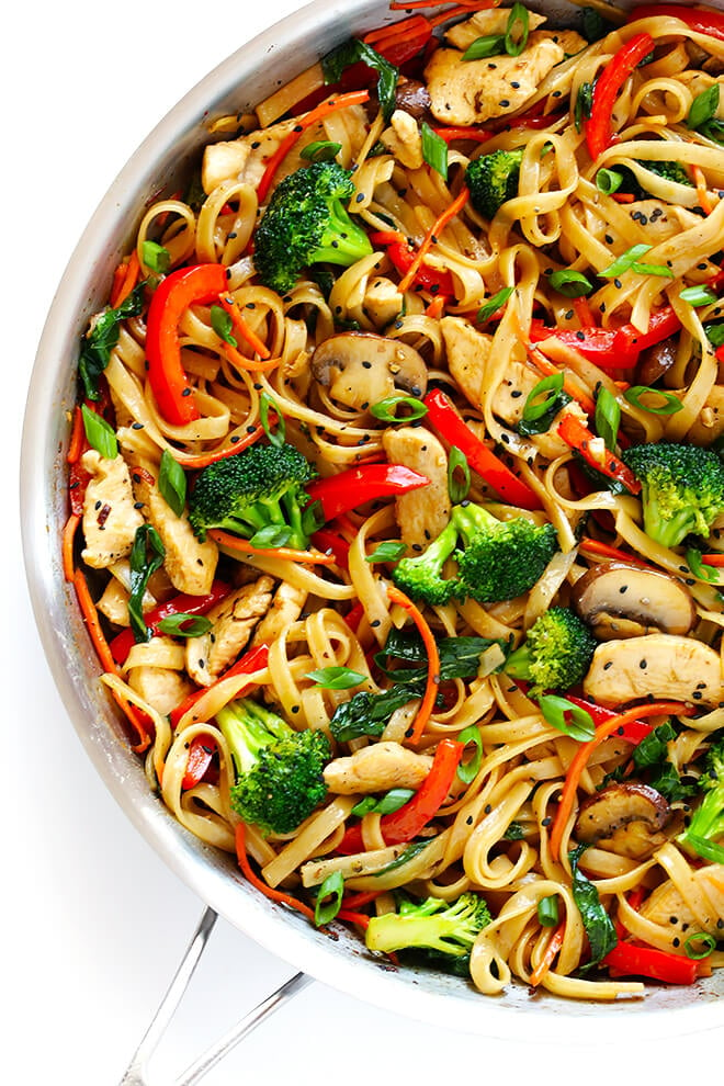 This 30-Minute Sesame Chicken Noodle Stir-Fry recipe is quick and easy to make, easy to customize with whatever fresh veggies or greens you have on hand, and it's tossed with the most delicious sesame-soy vinaigrette! | gimmesomeoven.com