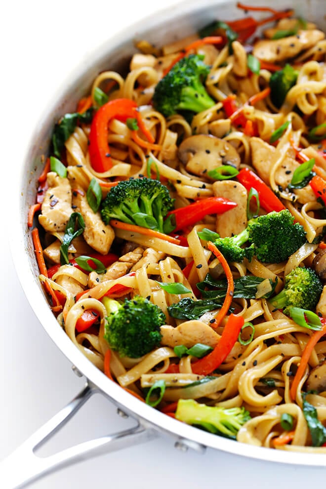 This 30-Minute Sesame Chicken Noodle Stir-Fry recipe is quick and easy to make, easy to customize with whatever fresh veggies or greens you have on hand, and it's tossed with the most delicious sesame-soy vinaigrette! | gimmesomeoven.com