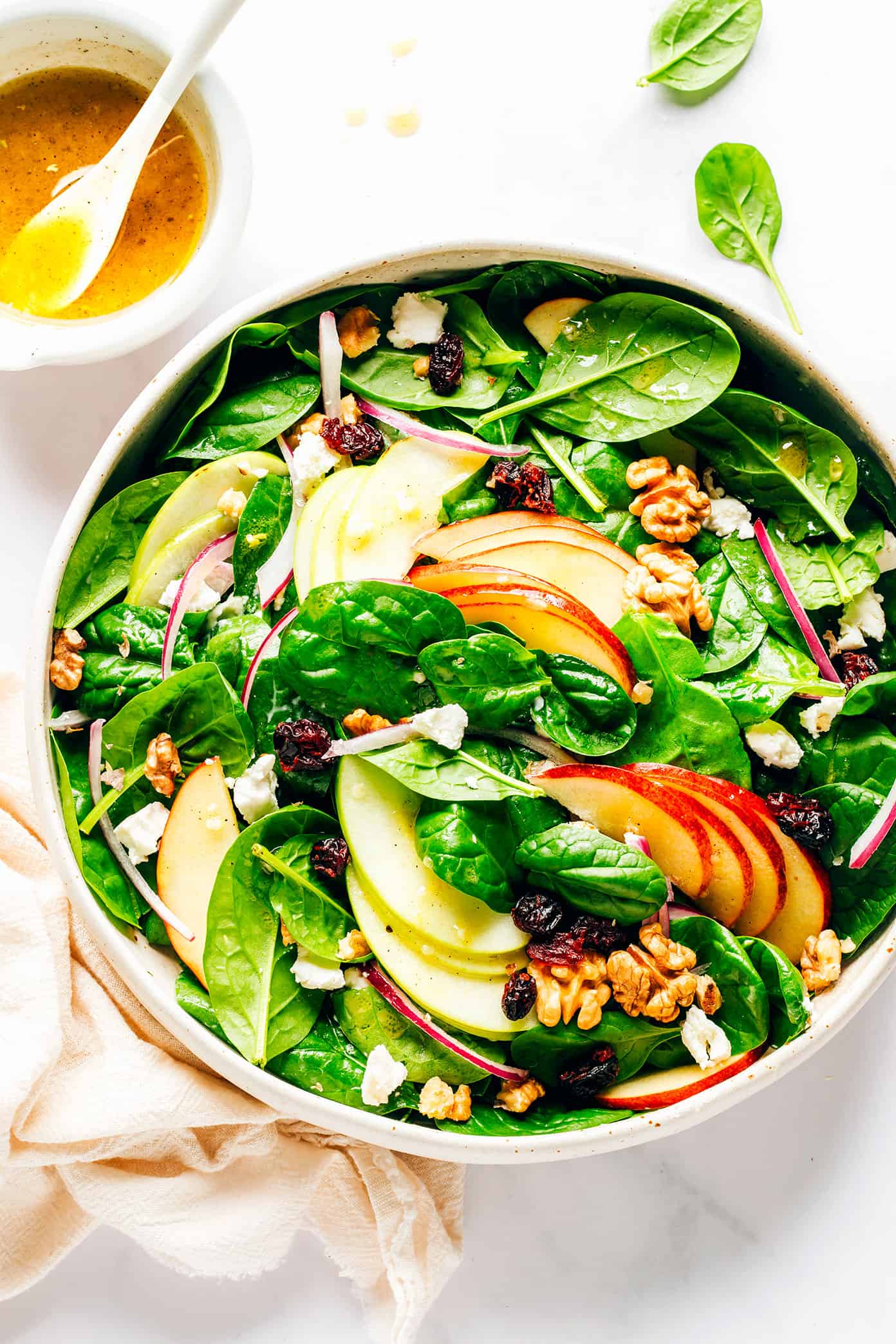 Apple Spinach Salad in Bowl with Apple Cider Vinaigrette