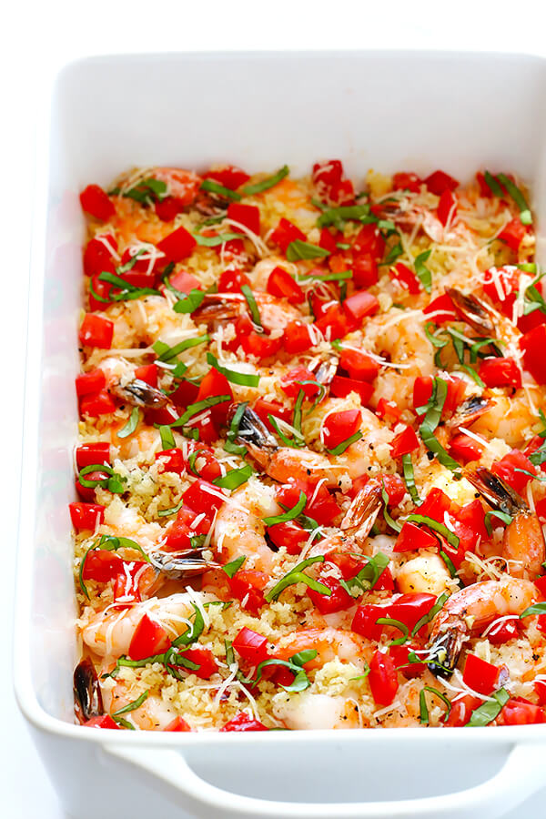This Bruschetta Baked Shrimp recipe is ready to go in less than 25 minutes, topped with garlicky breadcrumbs and all of the delicious flavors of fresh bruschetta. | gimmesomeoven.com