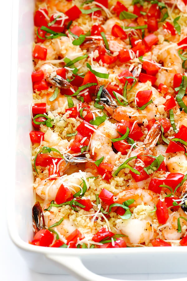 This Bruschetta Baked Shrimp recipe is ready to go in less than 25 minutes, topped with garlicky breadcrumbs and all of the delicious flavors of fresh bruschetta. | gimmesomeoven.com