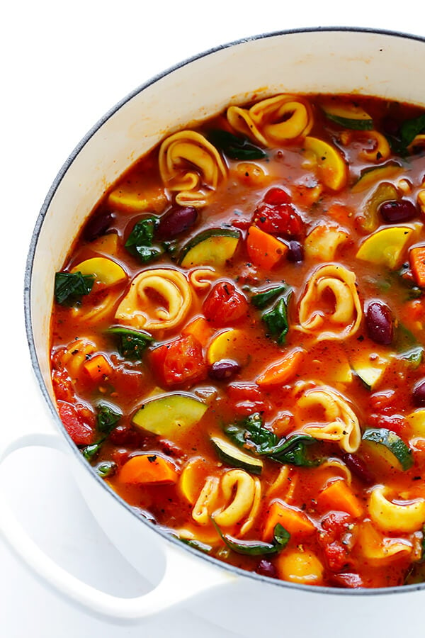 This Tortellini Minestrone recipe is overflowing with delicious veggies, and made extra-delicious with the addition of some cheesy tortellini. | gimmesomeoven.com