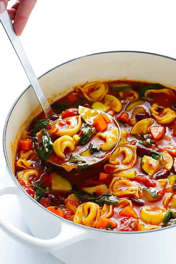 This Tortellini Minestrone recipe is overflowing with delicious veggies, and made extra-delicious with the addition of some cheesy tortellini. | gimmesomeoven.com