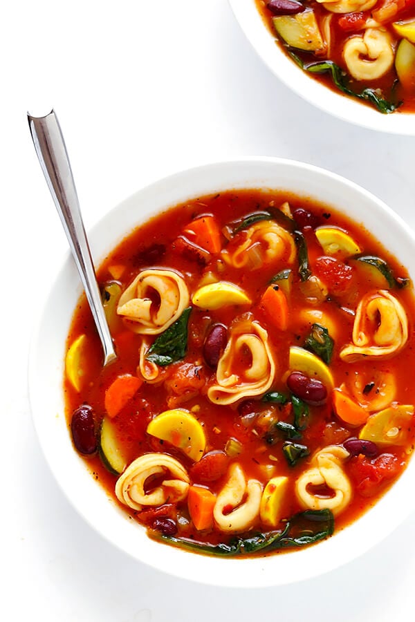 This Tortellini Minestrone recipe is overflowing with delicious veggies, and made extra-delicious with the addition of some cheesy tortellini. | gimmesomeoven.com
