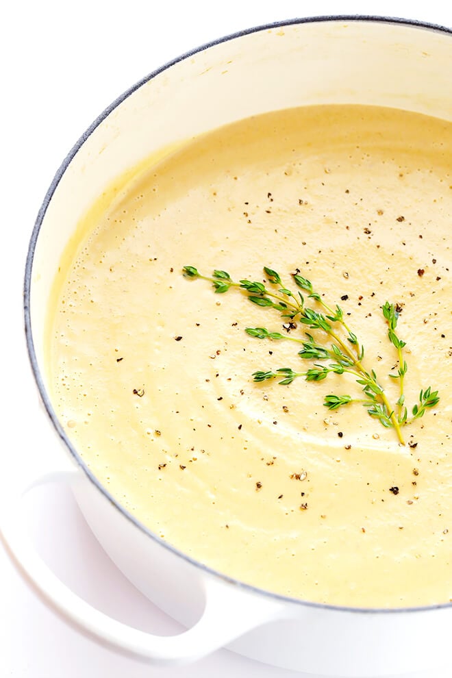 This Creamy Cauliflower Soup recipe is comfort food you can feel GOOD about. It's made with healthier ingredients, it's quick and easy to make, and it is so comforting and tasty. | gimmesomeoven.com (Vegan | Gluten-Free)