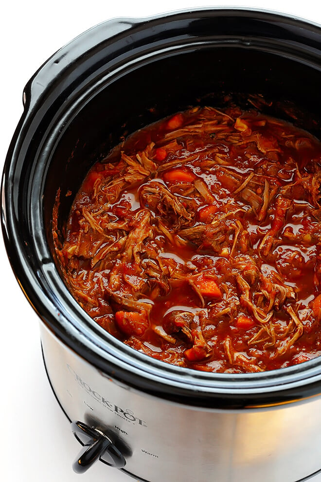 This Slow Cooker Beef Ragu is quick and easy to prep, and slow-simmered in the most AMAZING tomato sauce. Serve it over pasta, polenta, or whatever sounds good. | gimmesomeoven.com