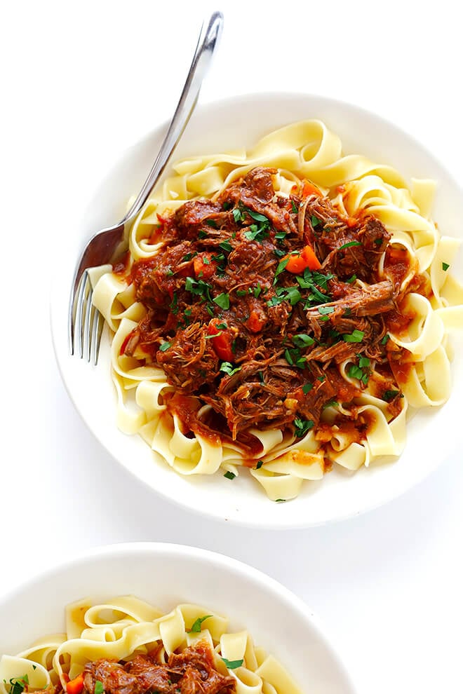 This Slow Cooker Beef Ragu is quick and easy to prep, and slow-simmered in the most AMAZING tomato sauce. Serve it over pasta, polenta, or whatever sounds good. | gimmesomeoven.com