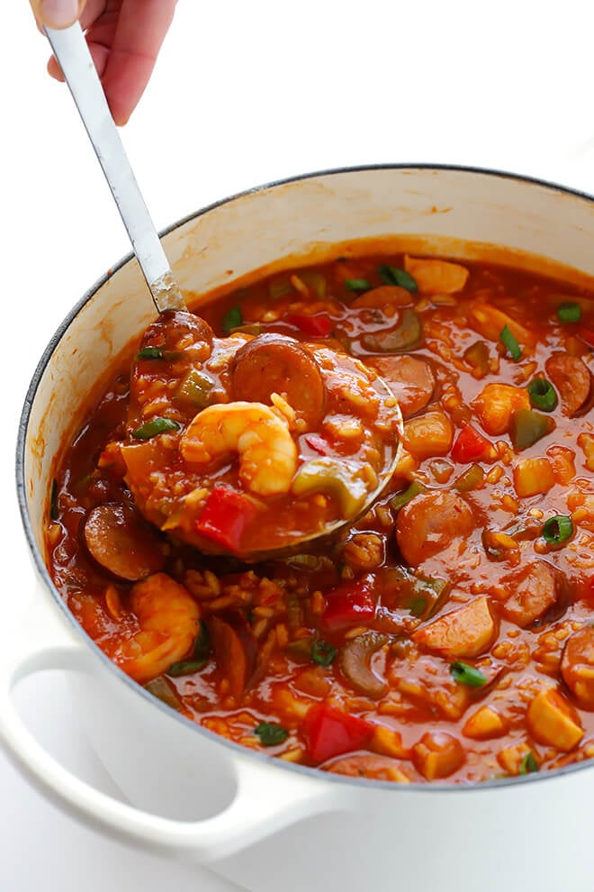 This Jambalaya Soup recipe can be made with shrimp, chicken, Andouille sausage -- or all three! It's easy to make, and so hearty and delicious. | gimmesomeoven.com