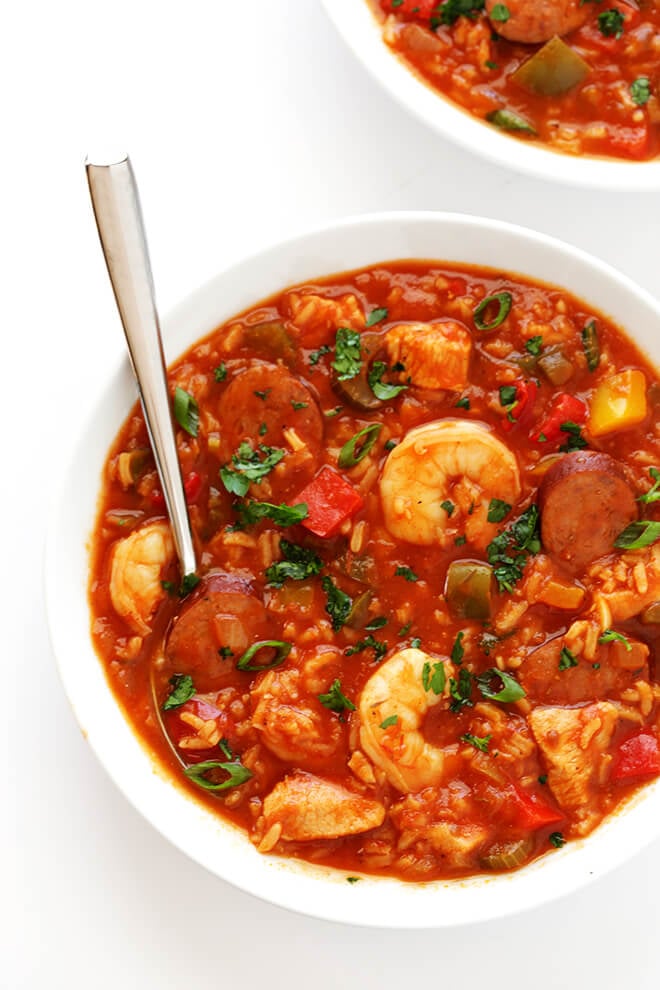 This Jambalaya Soup recipe can be made with shrimp, chicken, Andouille sausage -- or all three! It's easy to make, and so hearty and delicious. | gimmesomeoven.com