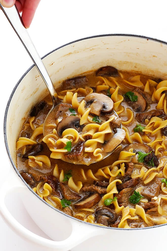 This Beef Stroganoff Soup recipe is easy to make, full of tender beef and noodles, and an absolutely delicious dinner! | gimmesomeoven.com