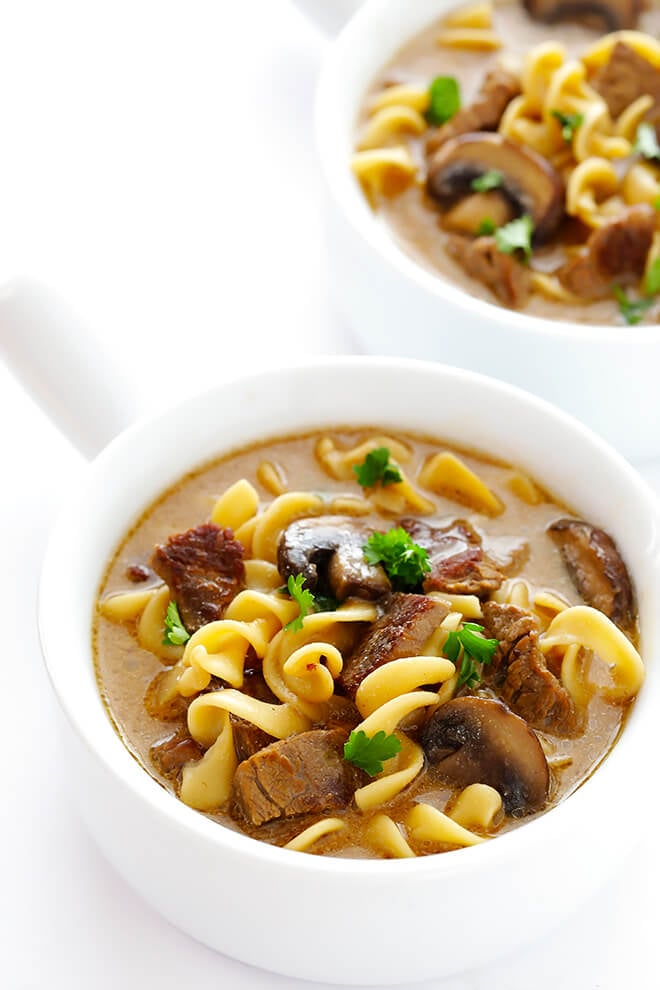 This Beef Stroganoff Soup recipe is easy to make, full of tender beef and noodles, and an absolutely delicious dinner! | gimmesomeoven.com