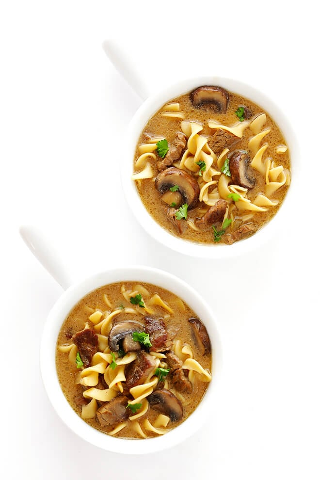 This Beef Stroganoff Soup recipe is easy to make, full of tender beef and noodles, and an absolutely delicious dinner! | gimmesomeoven.com