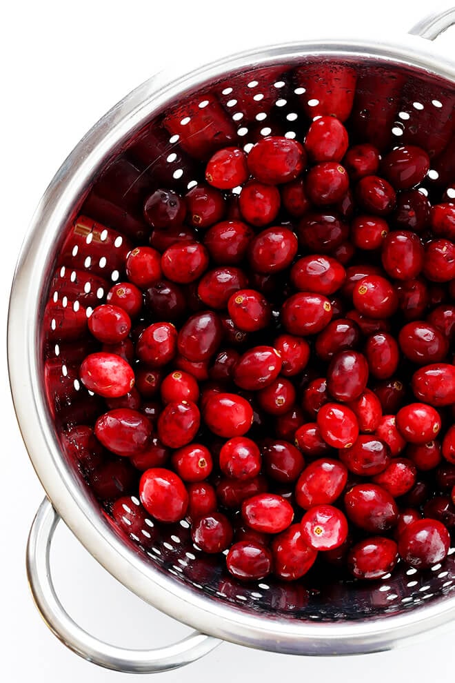 This Very Merry Cranberry Cream Cheese Dip is SUPER easy to make, and the perfect appetizer (or dessert!) for entertaining around Christmas and the holidays! | gimmesomeoven.com