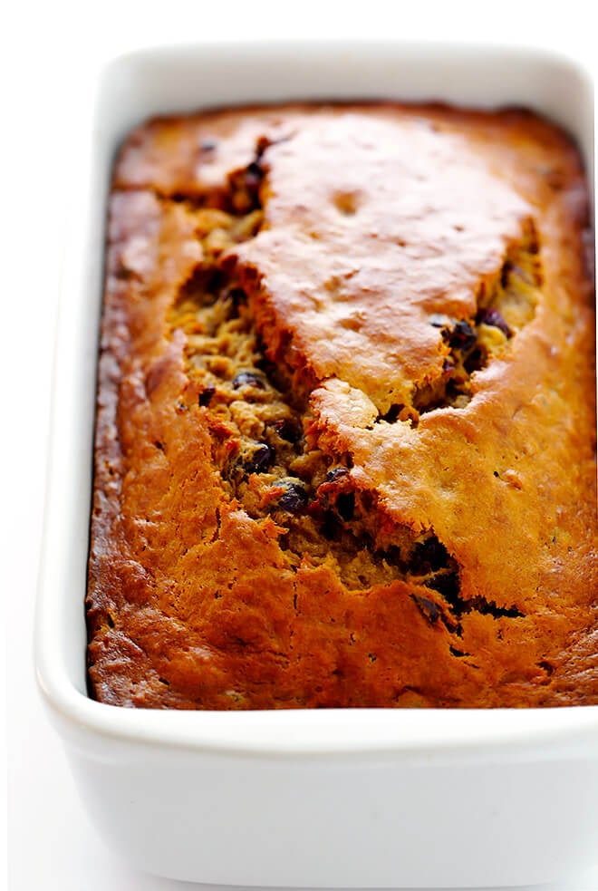 This Cranberry Orange Banana Bread recipe is easy to make, drizzled with a yummy orange glaze, and perfectly moist and delicious! | gimmesomeoven.com