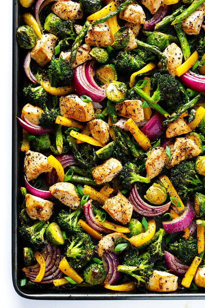 This delicious Sheet Pan Chicken and Veggies "Stir Fry" dinner recipe is quick and easy to prepare, and made with a delicious sesame-soy dressing that everyone will love. Plus, it's easy to make-ahead and refrigerate if you'd like to do some meal planning for the week! | gimmesomeoven.com