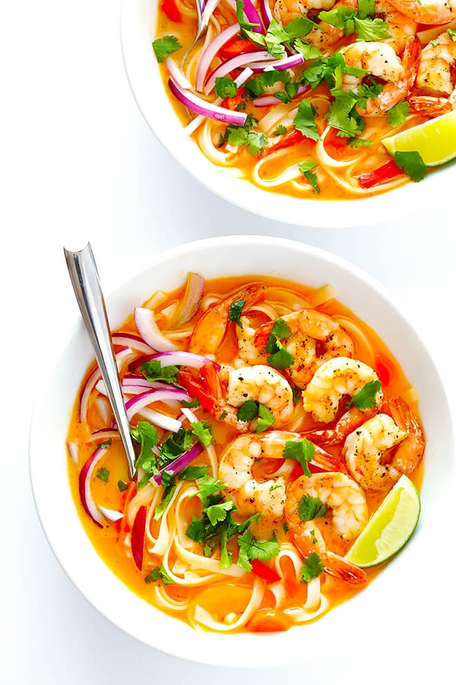 These Comforting Curry Noodle Bowls are easy to make with shrimp (or your favorite protein), and full of fresh and creamy coconut curry flavors that everyone will love. | gimmesomeoven.com