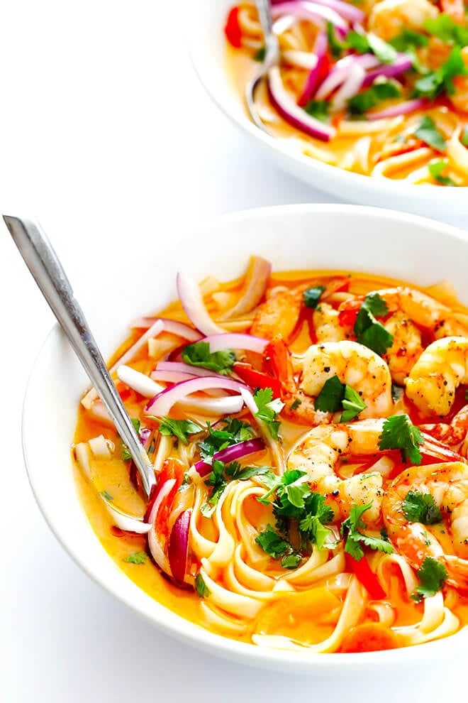 These Comforting Curry Noodle Bowls are easy to make with shrimp (or your favorite protein), and full of fresh and creamy coconut curry flavors that everyone will love. | gimmesomeoven.com